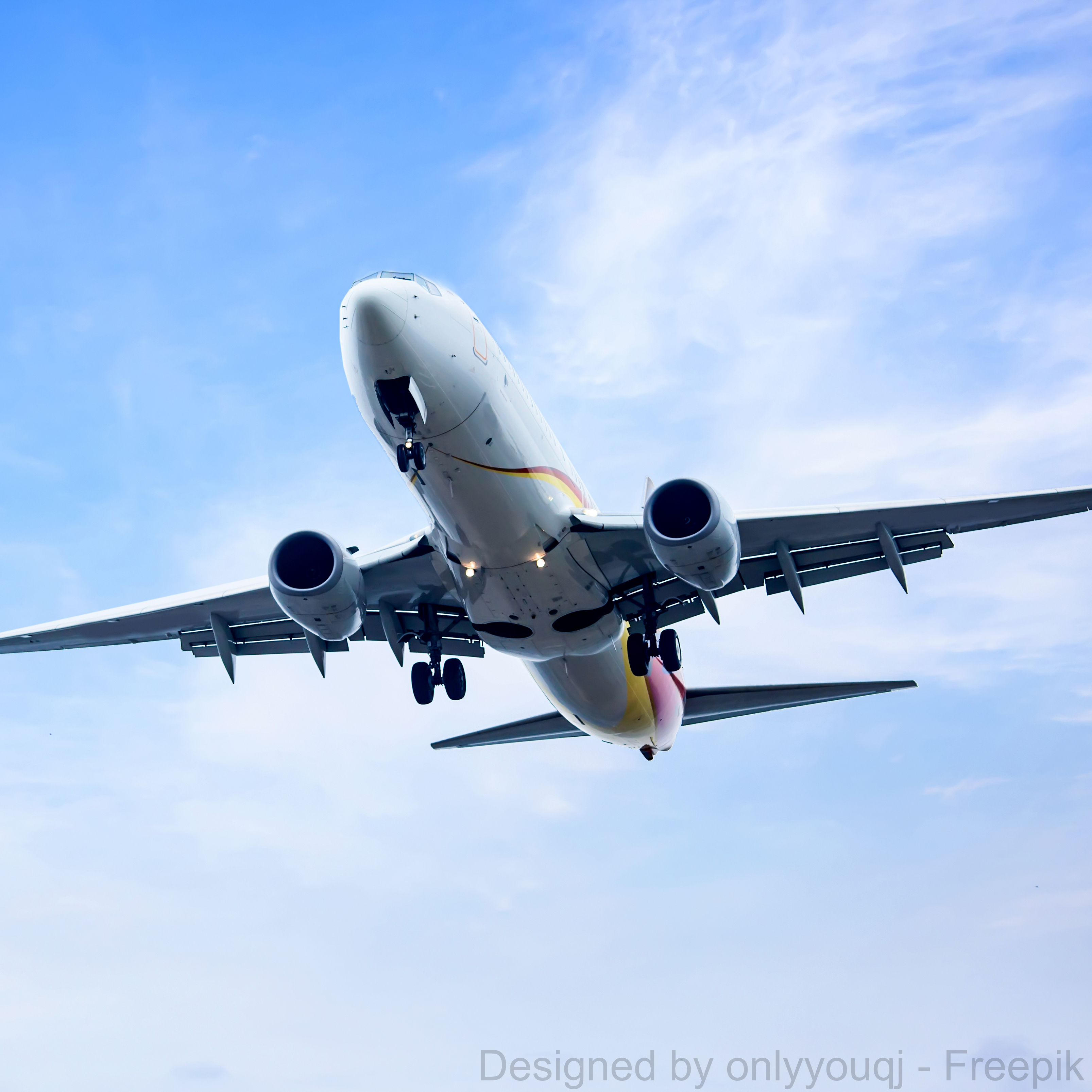 Ein Flugzeug in Nahaufnahme, das Flugzeugabgase in die Luft ausstößt.